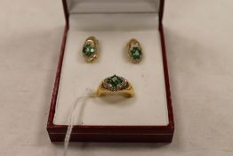 A pair of continental yellow metal diamond and emerald earrings, together with the matching ring. (