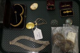 A yellow metal filigree bangle, together with yellow metal locket, two 9ct gold bar brooches,