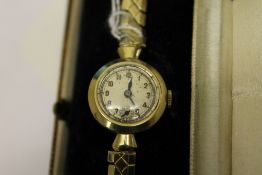 A 9ct gold Rolex lady's watch numbered 4