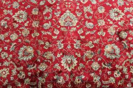 A Kashmir fringed rug with vine design o