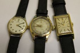 A 9ct gold Omega lady's wrist watch, tog