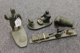 An interesting collection of four Inuit stone carvings, comprising of Walrus, Standing Eskimo,