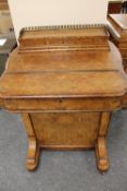 A Victorian inlaid burr walnut davenport