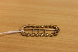 A Georgian gold buckle. CONDITION REPORT: Tested as a high carat gold.
