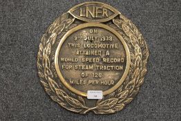 A brass LNER 'Mallard' plate, diameter 29 cm. CONDITION REPORT: A reproduction item in good