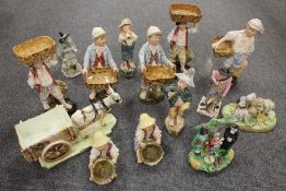 A collection of fourteen Staffordshire and other pottery figures depicting farm workers etc. (14)