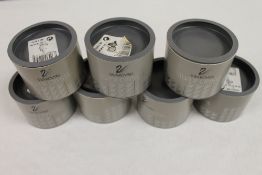 A collection of seven Swarovski crystal