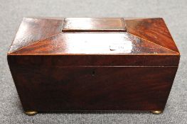 A nineteenth century inlaid mahogany tea caddy, width 29 cm. CONDITION REPORT: Missing glass liner