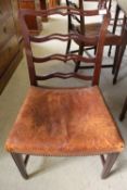 A set of eight nineteenth century mahogany dining chairs upholstered in brown leather (8)