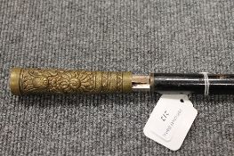 A late Victorian sword stick with brass embossed terminal.  CONDITION REPORT: Good time aged
