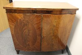 A nineteenth century inlaid mahogany double door cabinet, with 106cm.