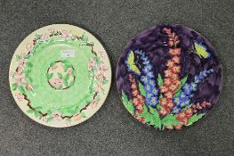 Two Maling plaques - decorated with flowers, diameter 28.5 cm.  CONDITION REPORT: Good condition,