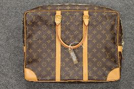 A Louis Vuitton document case, width 43 cm.  CONDITION REPORT: Excellent Condition.