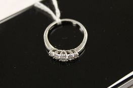 A platinum five stone diamond ring, 0.5ct. CONDITION REPORT: Good condition.