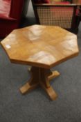 A Robert Thompson of Kilburn (Mouseman) carved oak octagonal occasional table, width 50cm.