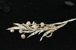 A diamond leaf brooch, approximately 3ct, 10.9g, length 8 cm. CONDITION REPORT: Good condition.