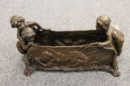 A bronze cherub planter, width 28 cm.  CONDITION REPORT: Good Condition, twentieth century example