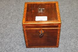 A Victorian inlaid mahogany square tea caddy, with key, width 12.5 cm. CONDITION REPORT: Good