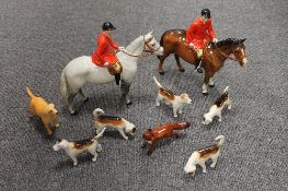 An eight piece Beswick hunting set, together with a labrador of the same manufacture. (9)