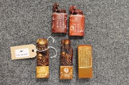Two pairs of carved Chinese figures, together with a desk seal. (5) CONDITION REPORT: Good