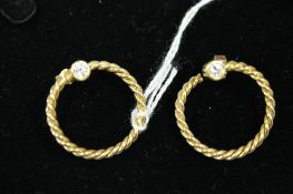 A pair of 18ct gold diamond set earrings, approximately 0.5ct. (2) CONDITION REPORT: Good condition.