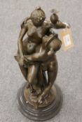 A bronze study depicting lovers on black marble circular plinth, height 52 cm.  CONDITION REPORT: