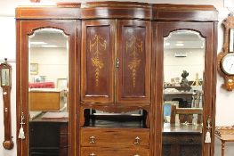 A late Victorian inlaid mahogany compactum wardrobe, width 186cm,