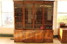 A Georgian style mahogany breakfront four door bookcase, width 204cm.