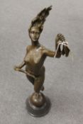 After Danase Cattano - bronze figure depicting a Lady with arm raised, on a black marble socle,