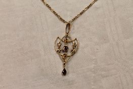 A 9ct gold Edwardian pendant on necklace, 5.8g. CONDITION REPORT: Good condition, the yellow metal