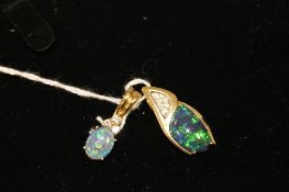 Two 18ct gold opal and diamond pendants. (2) CONDITION REPORT: Good condition. 7.2g gross.