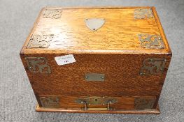 A late Victorian, oak correspondence box, width 29 cm.   CONDITION REPORT: Missing a handle to the