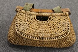 An early twentieth century fishing creel, width 40 cm. CONDITION REPORT: Good time aged condition.