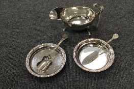 A silver sauce boat, Birmingham, 1947, together with a pair of silver dishes and a silver butter