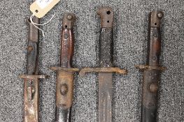 Four WW I period bayonets. (4) CONDITION REPORT: With corrosions and knocks associated with age,