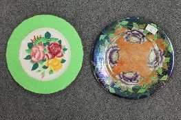 Two Maling plaques - decorated with rose sprays and peonies, diameter 28.5 cm. CONDITION REPORT: