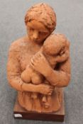 Karin Jonzen : Mother with Child, red clay study, signed, height 56cm, on wooden plinth.