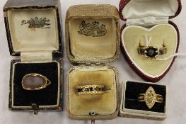 A collection of four antique mourning rings, some with inscriptions, enamel and from the Georgian