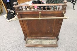 A late Victorian mahogany stick stand, width 67.5cm.