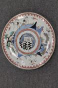 A Chinese plaque, with six character mark to base, diameter 41 cm.  CONDITION REPORT: Minor