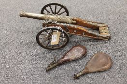 An early twentieth century table gun carriage, in detail with rods, together with two nineteenth