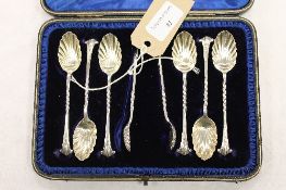 A set of six silver teaspoons, with matching sugar tongs, Sheffield 1892, cased. CONDITION REPORT: