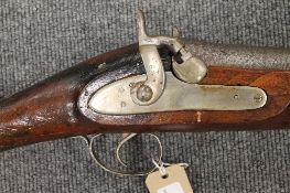 A nineteenth century hammer action rifle. CONDITION REPORT: Good condition, appears to be unmarked.