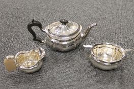 A silver three piece tea service, London 1915, weight, 28 oz.  CONDITION REPORT: Good Condition with