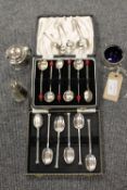 A silver three piece cruet set, together with six silver cruet spoons and two sets of six silver