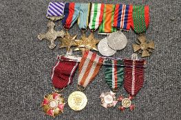 A group of seven WW II period medals, on suspension ribbons, together with four continental medals