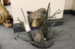 A Mark Hopkins bronze sculpture - Lion in grass, limited edition, height 34 cm. CONDITION REPORT: