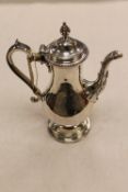 An eighteenth century silver coffee pot, London 1774, 18.7 oz. CONDITION REPORT: Good condition,