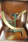 A Goodbrand & Co brass yarn scale, contained within a mahogany box, width 37 cm. CONDITION REPORT: