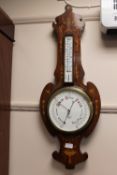 A late Victorian inlaid mahogany barometer by J.Pitkin, London.
